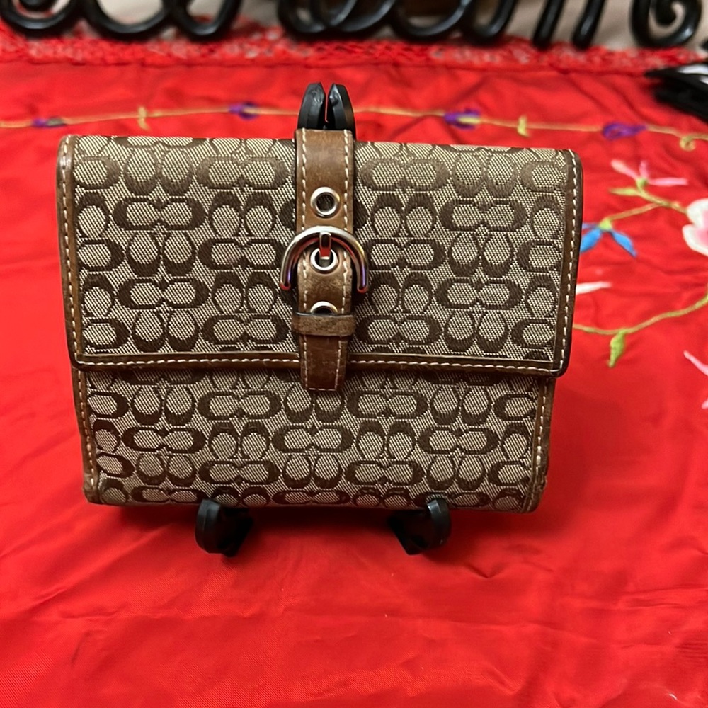 COACH tan and brown monogrammed wallet